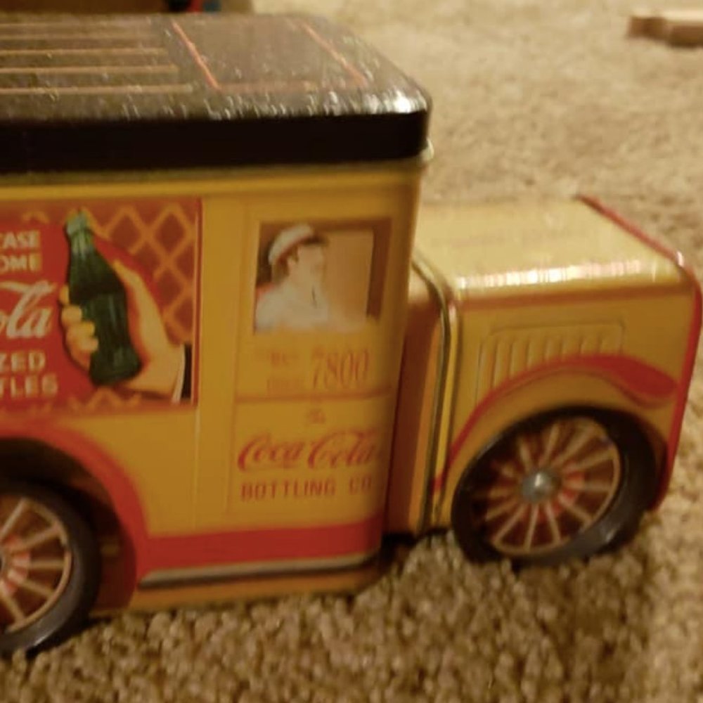 Coca-Cola themed metal tin in the shape of a truck